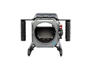 Front view of the Salty SIREN housing for the Sony FX6, featuring a rugged metal body with dual textured side handles and a large circular lens port opening. Built for ocean photography, the housing includes a stable skid base and external control dials.