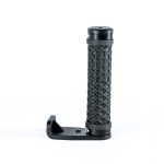 A black camera housing side handle from Salty Surf Housings with a textured, diamond-patterned surface and an L-shaped mounting bracket, designed for secure handling during underwater or surf photography.