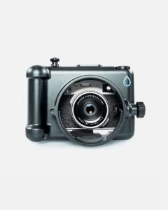 Fujifilm X100VI underwater housing front view, black anodized aluminum, open lens port mount, camera installed