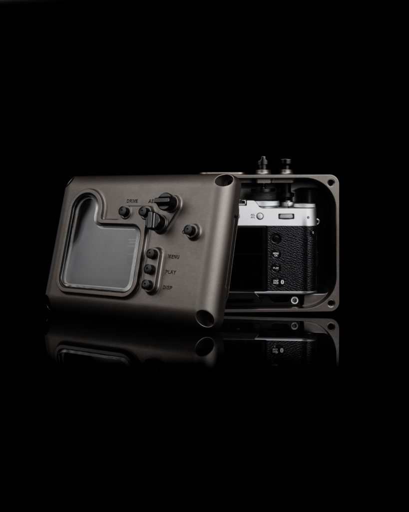 Fujifilm X100VI underwater housing Kelp Bronze open with camera